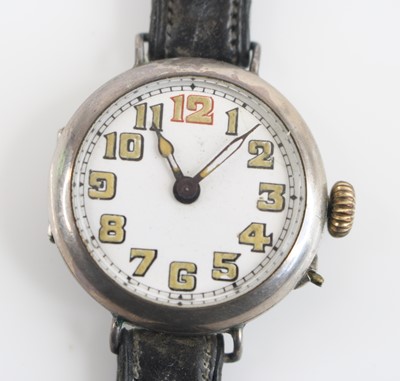Lot 159 - A WW I silver cased trench watch, the white...