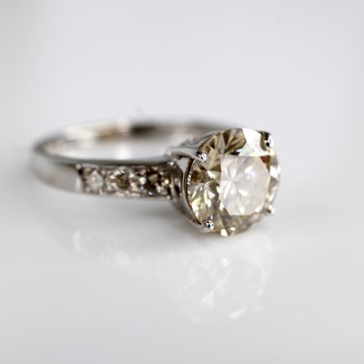 Lot 2133 - A white metal diamond solitaire ring,...