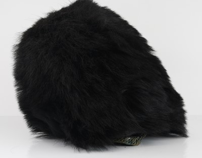 Lot 119 - A Scots Guards bearskin hat, with wicker frame...