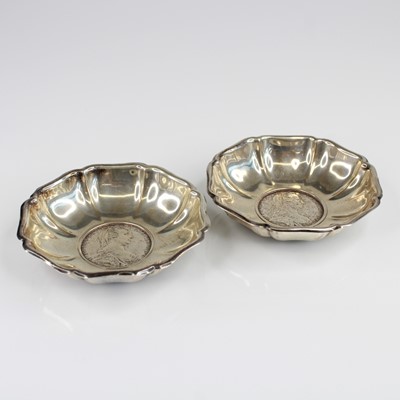 Lot 73 - A pair of Austrian silver dishes, each inset...