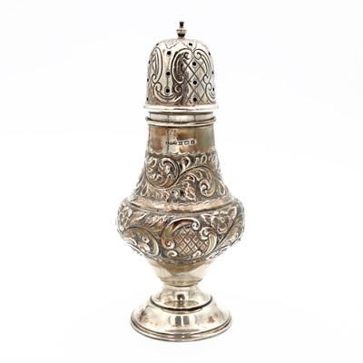 Lot 97 - A George V silver pedestal pepperette, of...