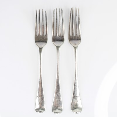 Lot 59 - A pair of George III silver table forks, in...