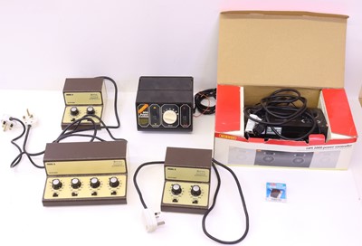 Lot 335 - A collection of model railway control boxes,...