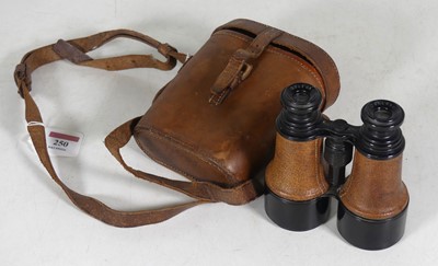 Lot 250 - A pair of early 20th century leather-clad...