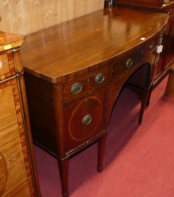 Lot 568 - Circa 1900 mahogany bow front kneehole...