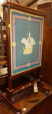 Lot 674 - A mid-Victorian mahogany fire screen, with...