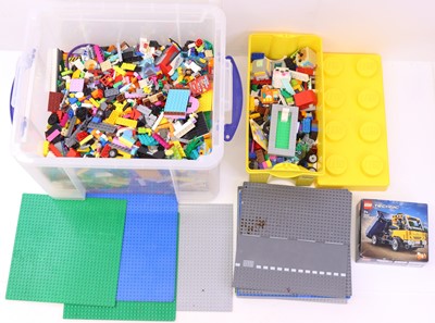 Lot 46 - 2 boxes containing loose Lego plastic parts in...