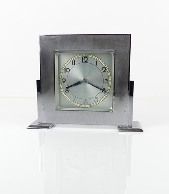 Lot 333 - An Art Deco chromed metal mantel clock, with...