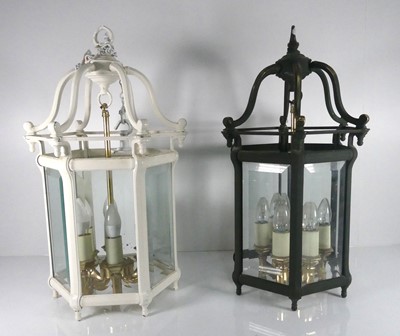 Lot 376 - A pair of bronze hall lanterns, one with green...