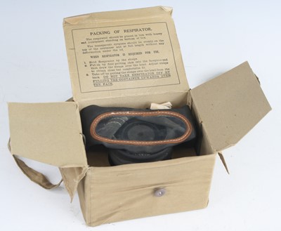 Lot 80 - A WW II child's respirator, in original box...