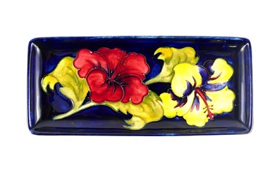 Lot 166 - A Moorcroft Hibiscus pattern pottery...