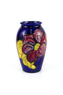 Lot 179 - A small Moorcroft Anemone pattern pottery vase,...