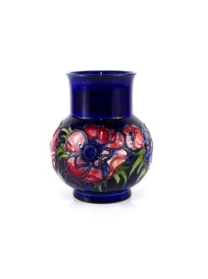 Lot 181 - A Moorcroft Anemone pattern pottery vase, the...