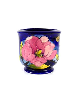 Lot 191 - A Moorcroft Pink Magnolia pattern pottery...