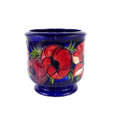 Lot 194 - A Moorcroft Anemone pattern pottery footed...