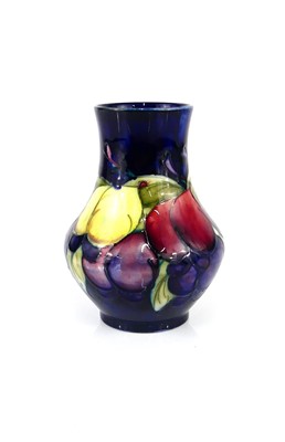 Lot 196 - A small Moorcroft Wisteria pattern pottery...