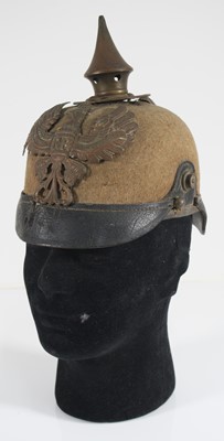 Lot 193 - A Prussian Ersatz pickelhaube, in green felt...