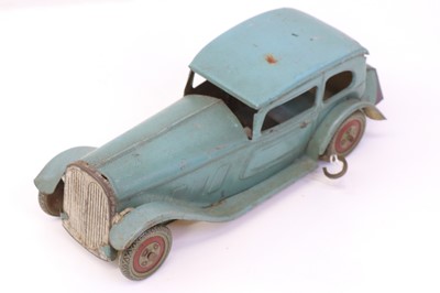Lot 68 - Wells Tinplate Clockwork model of a saloon car...