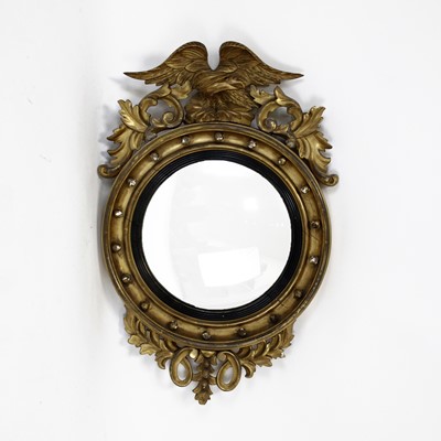 Lot 355 - A mid-19th century giltwood and gesso convex...