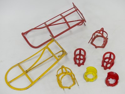 Lot 464 - A pair of red and yellow painted alloy saddle...