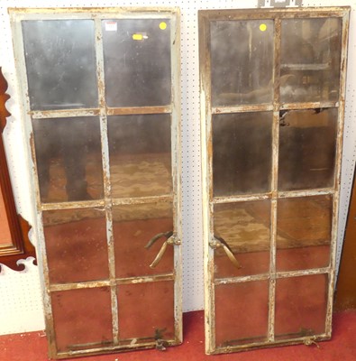 Lot 612 - A pair of rustic French painted wrought iron...