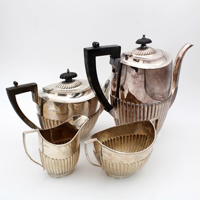 Lot 71 - A matched George V silver three-piece tea set,...