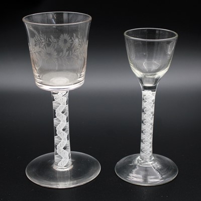 Lot 44 - A George II cordial glass, the ogee bowl above...