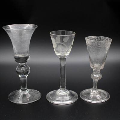 Lot 42 - A George II pedestal wine glass, having a bell-...