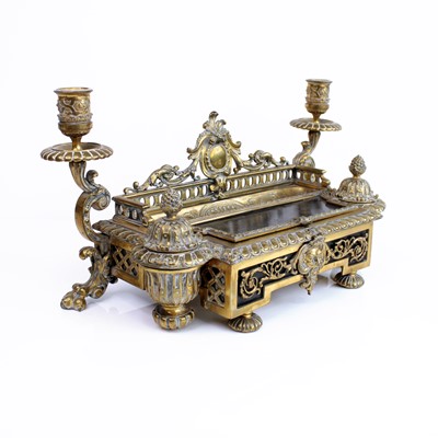 Lot 172 - A Victorian cast brass desk stand, having twin...