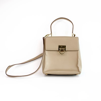 Lot 297 - Salvatore Ferragamo - Beige leather top-handle...