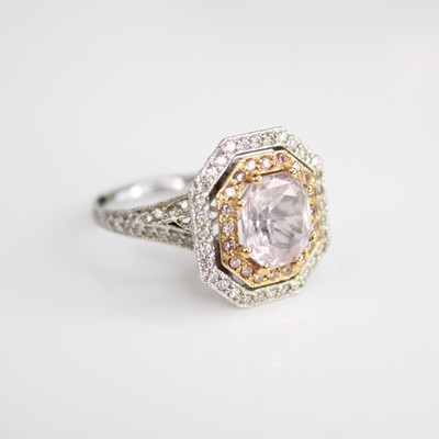 Lot 115 - An 18ct white and rose gold pink sapphire and...