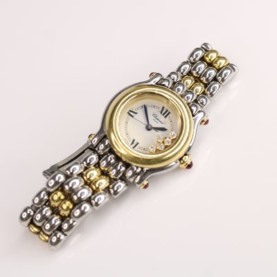 Lot 146 - A lady's steel and yellow metal Chopard Happy...