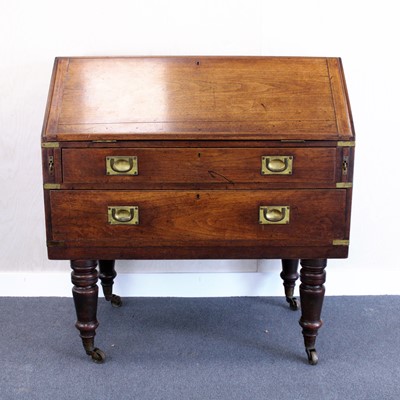 Lot 374 - A circa 1830 teak and brass bound campaign...