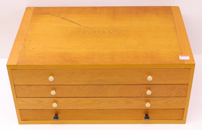 Lot 102 - An original Meccano oak four-drawer No. 10...