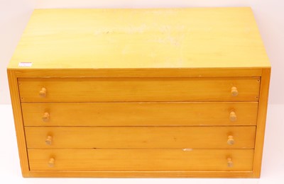 Lot 106 - A Meccano-style four-drawer pine storage unit...