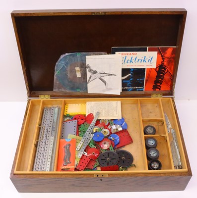 Lot 109 - A reproduction stained dark oak Meccano Outfit...