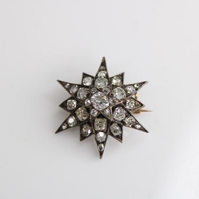 Lot 127 - A Victorian yellow and white metal diamond...