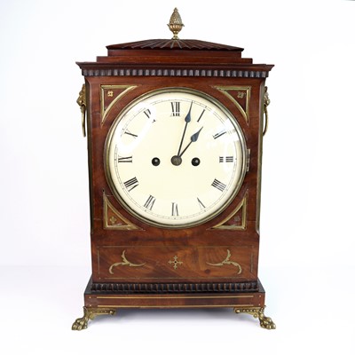 Lot 293 - A Regency mahogany and brass inlaid bracket...