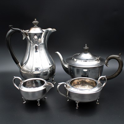 Lot 72 - A matched George V silver four-piece tea and...