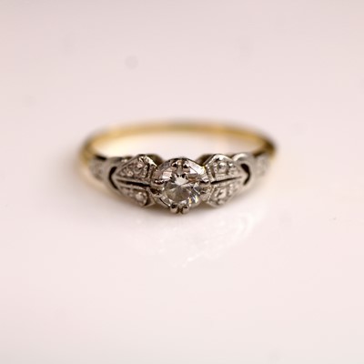 Lot 130 - A yellow and white metal diamond solitaire...