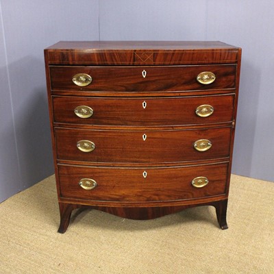Lot 368 - A Regency mahogany bowfront chest of four long...