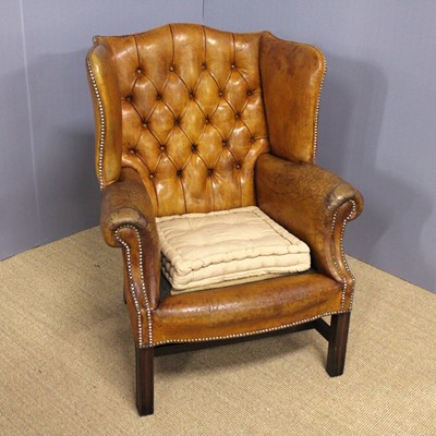 Lot 349 - A mahogany framed and leather upholstered...