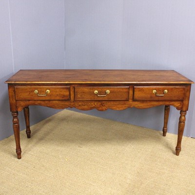 Lot 330 - An oak dresser base in the Georgian style,...