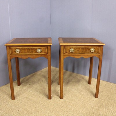 Lot 324 - A pair of walnut and figured walnut lamp...