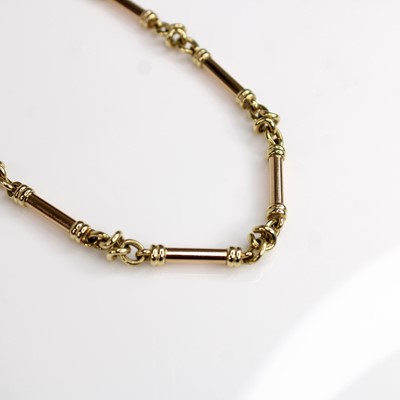 Lot 136 - A 9ct yellow and rose gold fancy knot and...