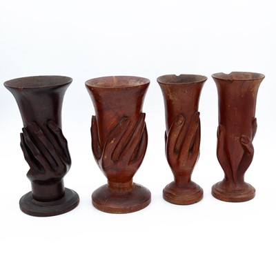 Lot 12 - A group of four Pitcairn Island carved...