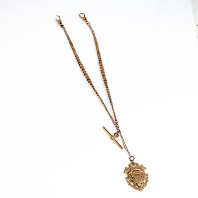 Lot 253 - A 9ct rose gold graduated curblink Albert...