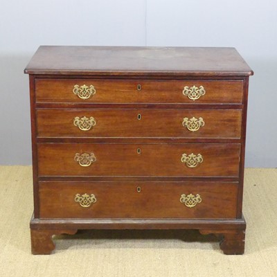 Lot 667 - A George III mahogany chest of four long...
