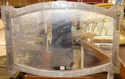 Lot 523 - A hammered metal framed and bevelled wall mirror