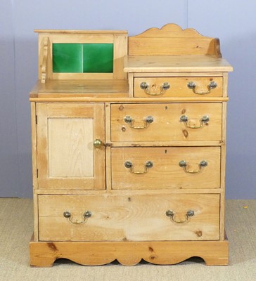 Lot 659 - A rustic pine wash chest, having green tiled...